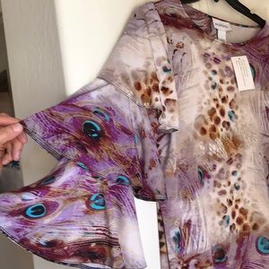 Peck and Peck with flowing triple section sleeves